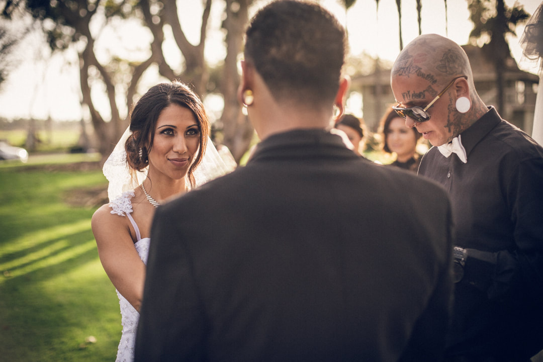 Bride looking at groom with alternative officiant