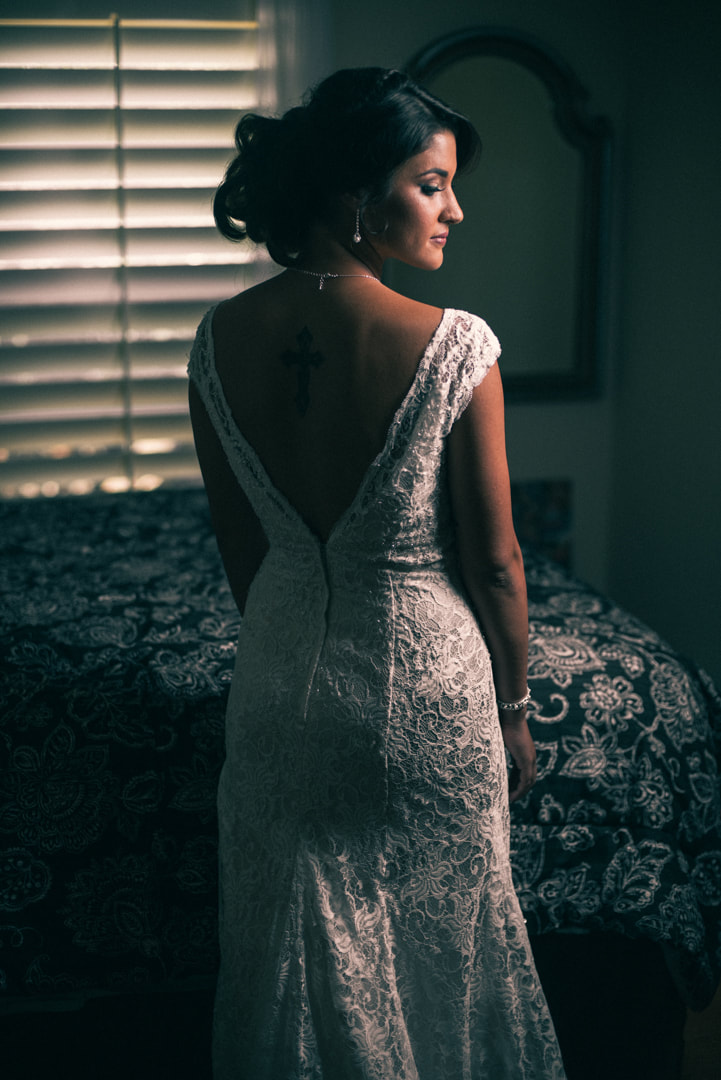 Bride wearing wedding gown before wedding